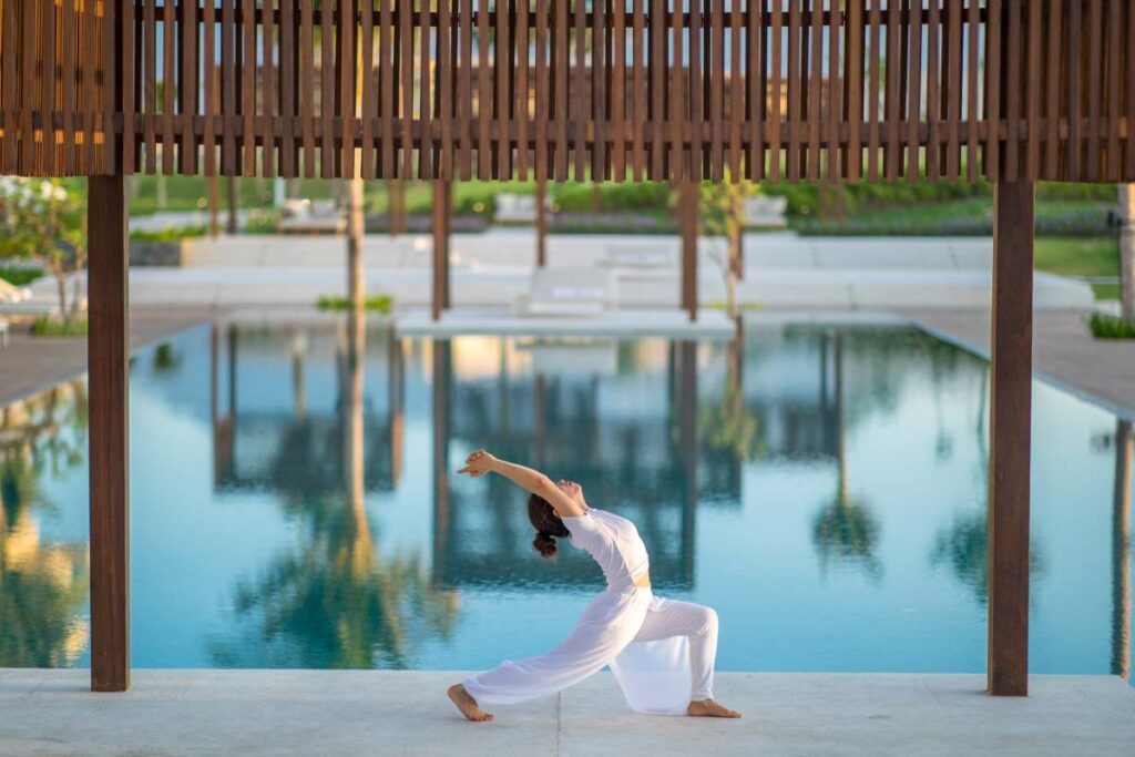 Morning yoga at Alma Resort Cam Ranh - Luxury Escapes