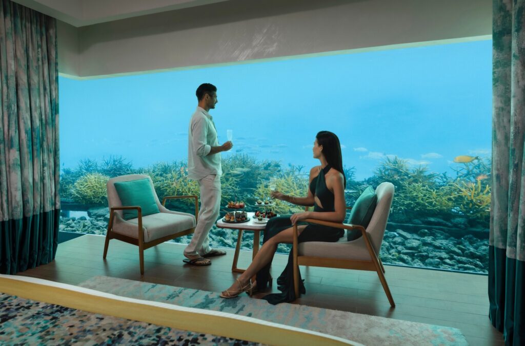 Couple in an underwater villa in the Maldives