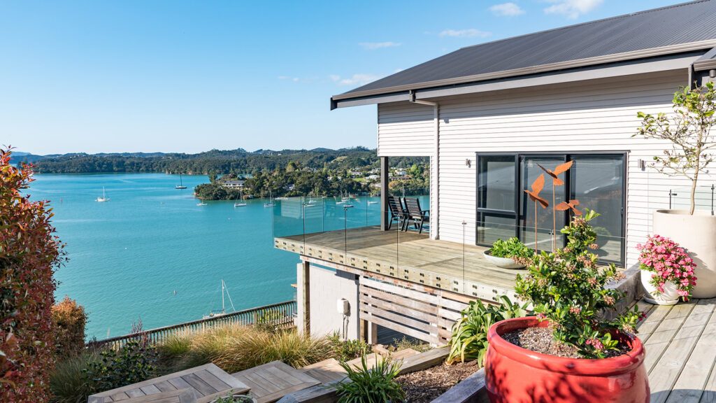 The deck overlooking the bay at Marina Cove Boutique Luxury Accommodation, one of New Zealand's best boutique hotels