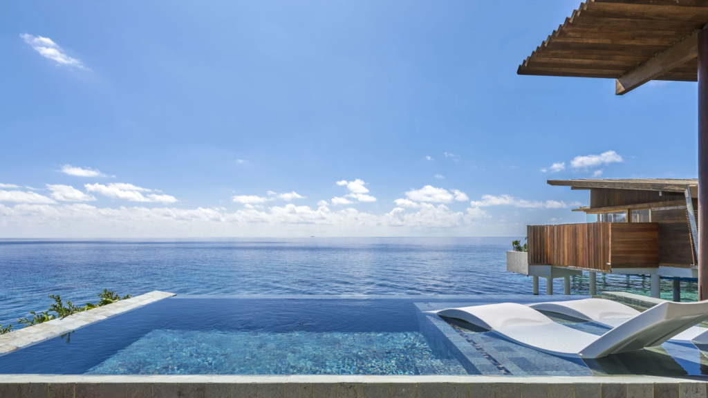 The sunken loungers in the private pool villa at Park Hyatt Maldives Hadahaa - Luxury Escapes
