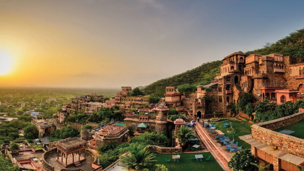A spectacular sunset from Neemrana Fort Palace near Jaipur, one of India's best palace hotels – Luxury Escapes