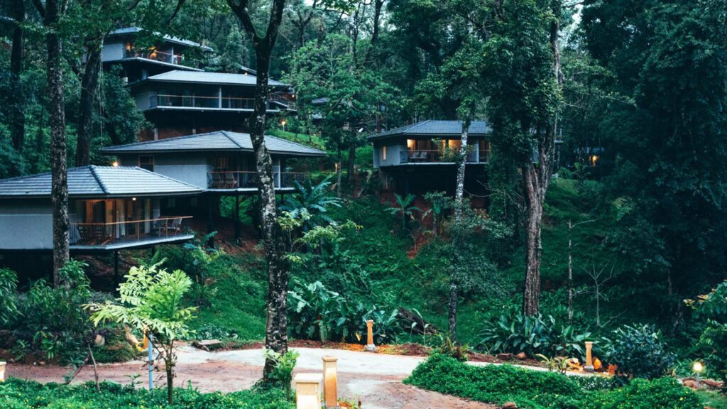 The site of WelcomHeritage Ayatana is one of Coorg's most spectacular, set among lush forested hills - Luxury Escapes