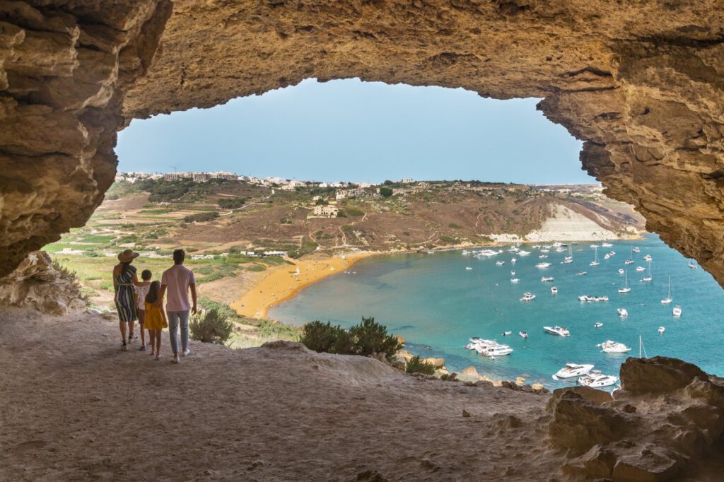 Visit the iconic red sand beaches at Gozo’s Ramla l-Ħamra in Malta – Luxury Escapes