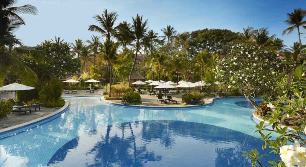 Lounge by the lagoon-style pool, ground yourself with yoga classes or hire a snorkel and paddleboard with a suite of exciting activities at Melia Bali, one of the island's best all-inclusive resorts - Luxury Escapes