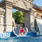 A water slide slide at AYANA Bali, one of the best kids clubs in Bali - Luxury Escapes