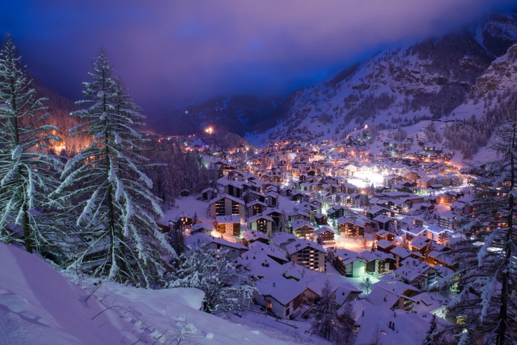 A ski town in Switzerland, one of the best places to spend Christmas in Europe - Luxury Escapes