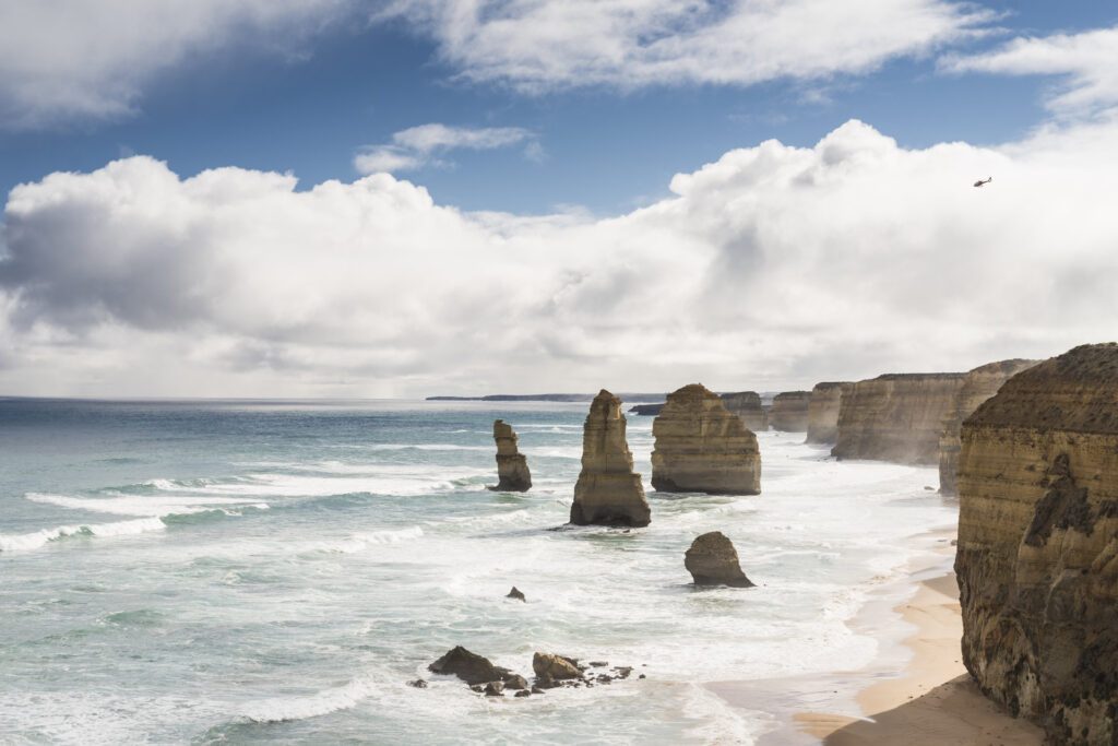 A stunning shot of the Twelve Apostles, Great Ocean Road - Luxury Escapes