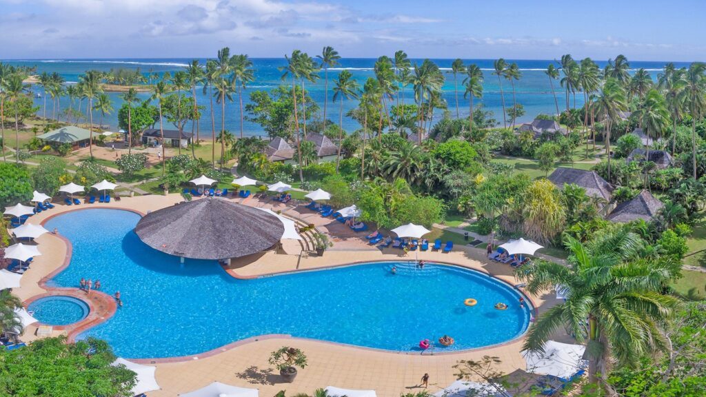 A view over the swimming pool at The Naviti Resort, one of the best family-friendly resorts in Fiji - Luxury Escapes