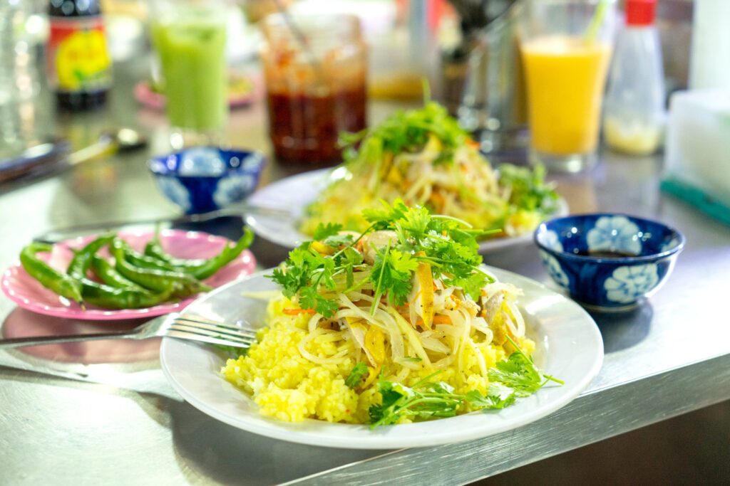 A plate of com ga – chicken rice, is a must-try in Hoi An – Luxury Escapes