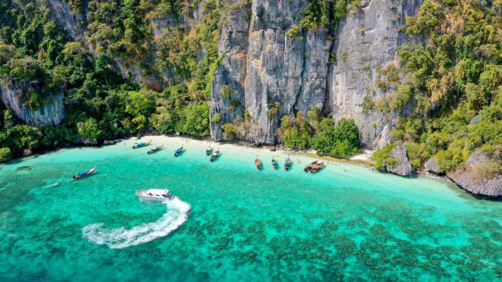 Reach the phenomenal Phi Phi Islands with our guide to getting around Thailand - Luxury Escapes