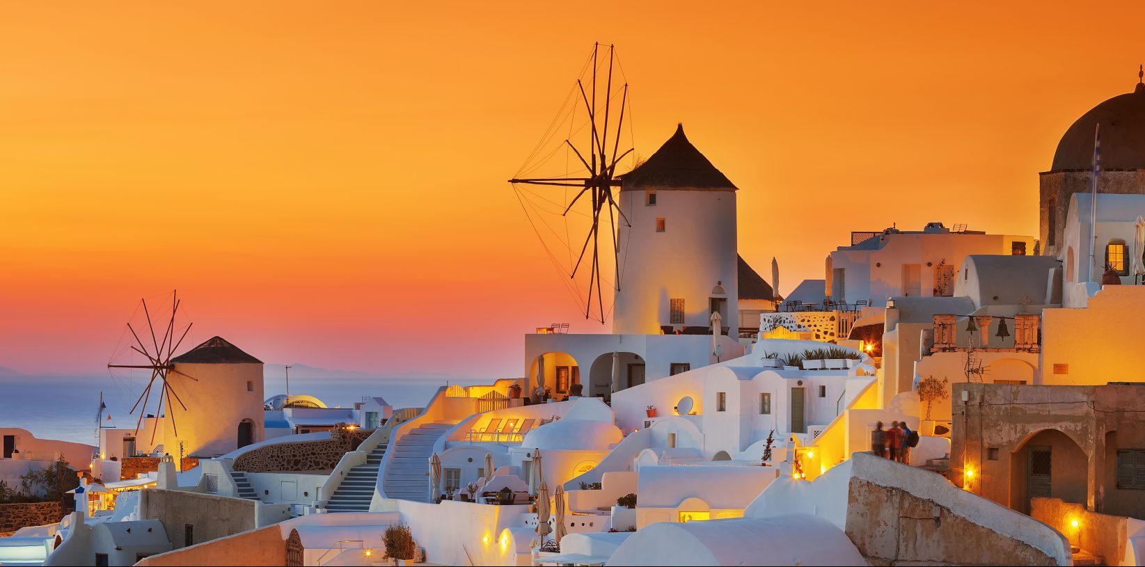 One of the world's most beautiful sunsets can be witnessed at Oia in Santorini - Luxury Escapes