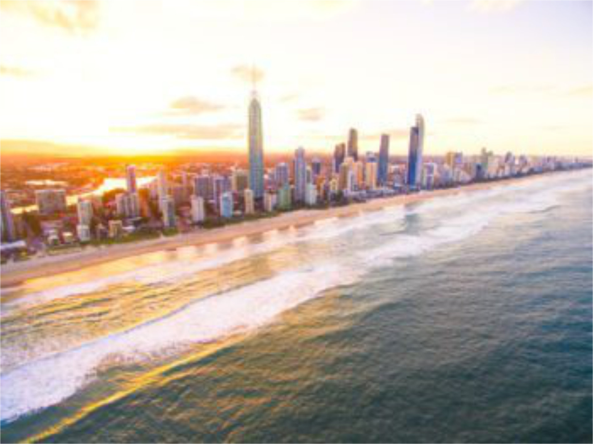 Surfers Paradise skyline at sunset from an aerial view||