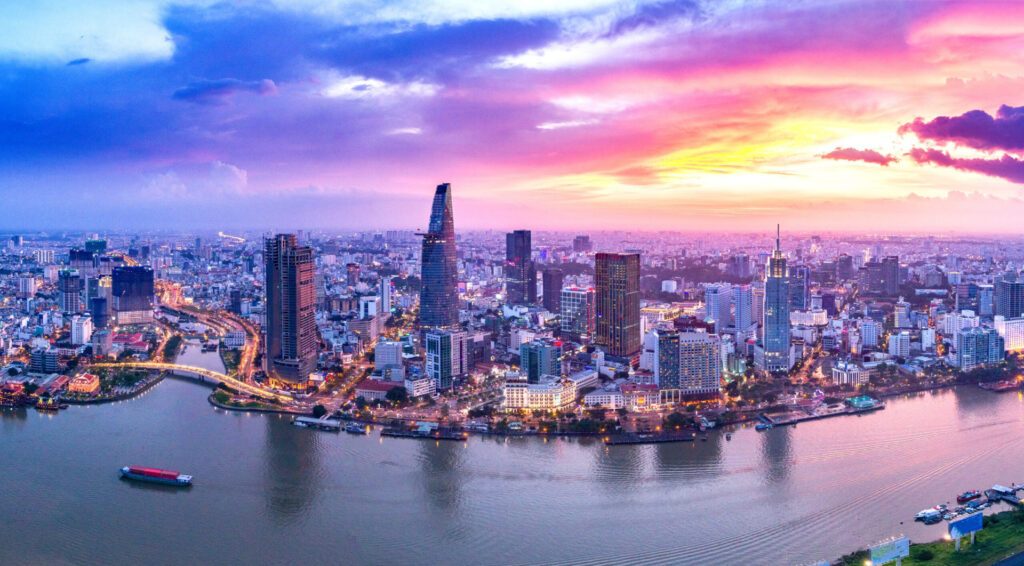 Boast floating in the Saigon River in Ho Chi Minh at sunset - Luxury Escapes