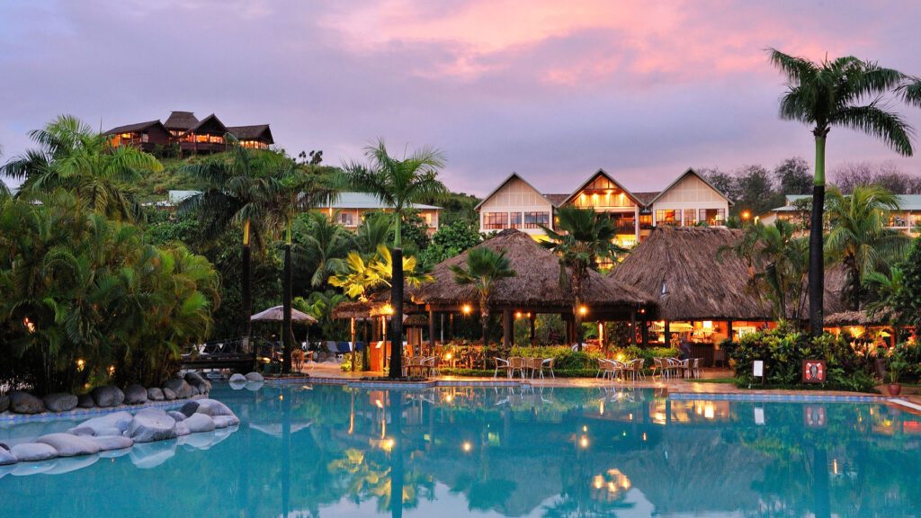 Pool at Outrigger Fiji Beach Resort, a family resort - Luxury Escapes 