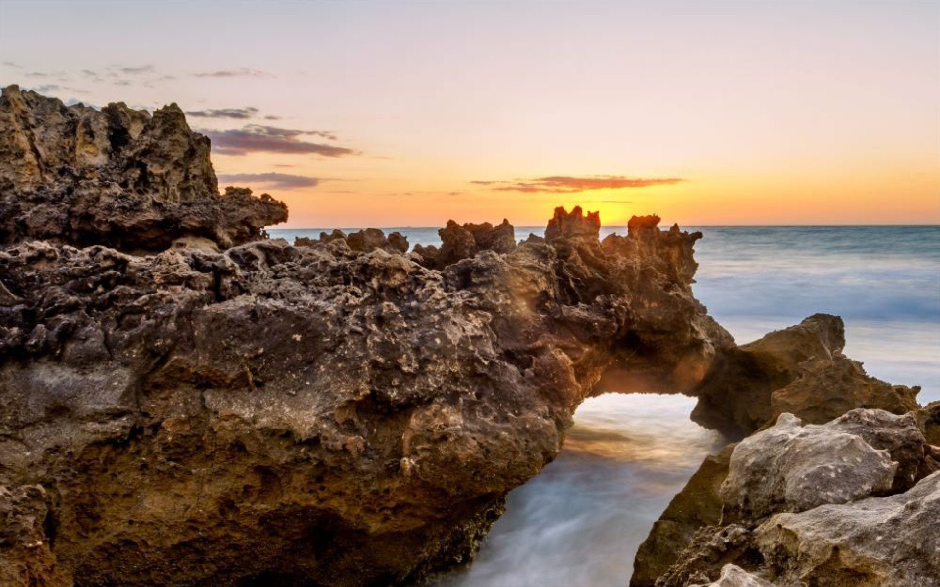 Rocky enclave on the waters of Bennion Beach, Western Australia - Luxury Escapes 