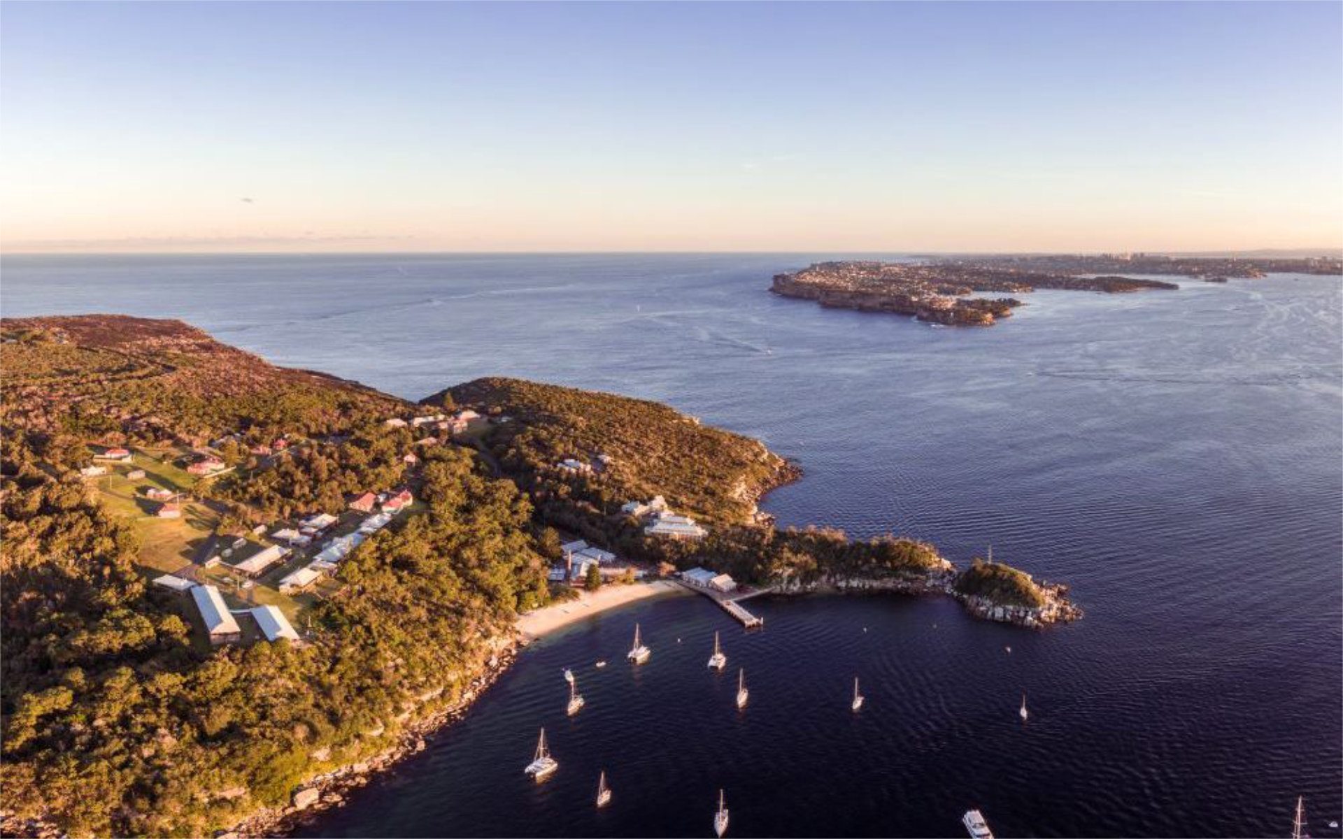 Aerial view of Store Beach in NSW, a hidden beach in Australia - Luxury Escapes 