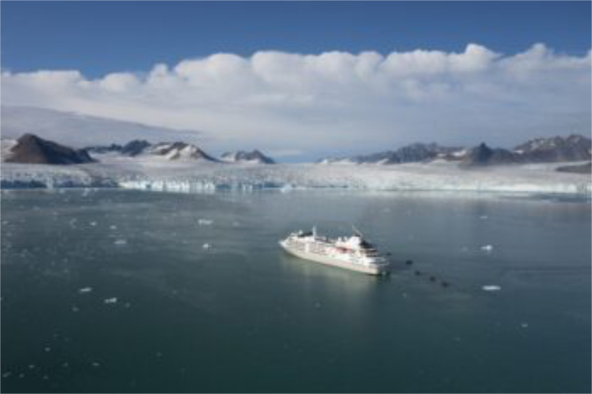 A luxury Silversea cruise ship cuts through the Antarctic - Luxury Escapes