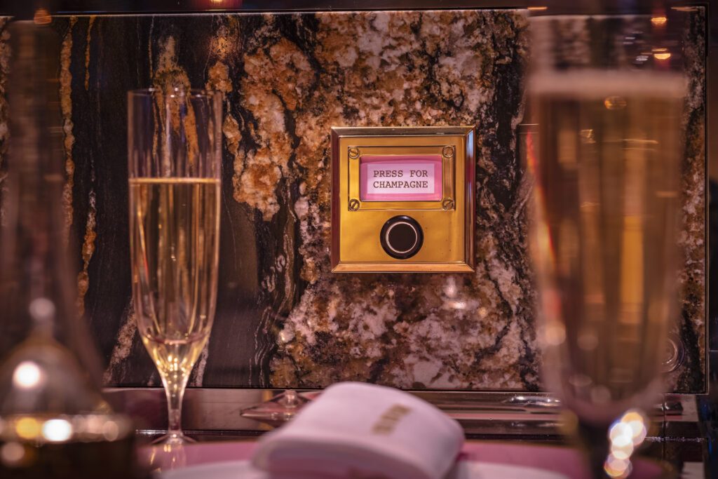 Press for champagne at Bob Bob Ricard, Soho, one of London's best restaurants. Image used with permission.
- Luxury Escapes