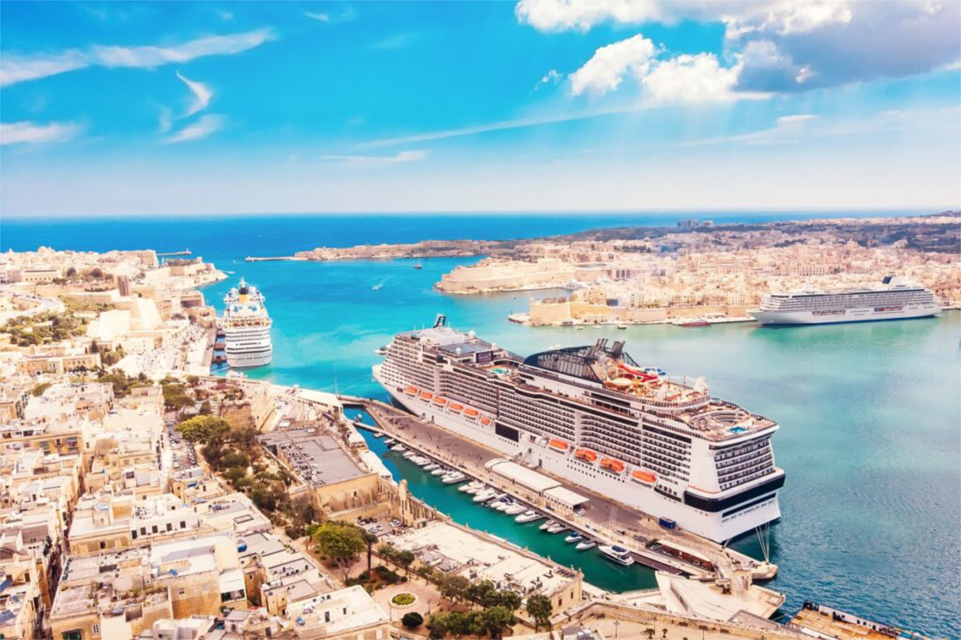 A cruise ship, docked in port in Europe.