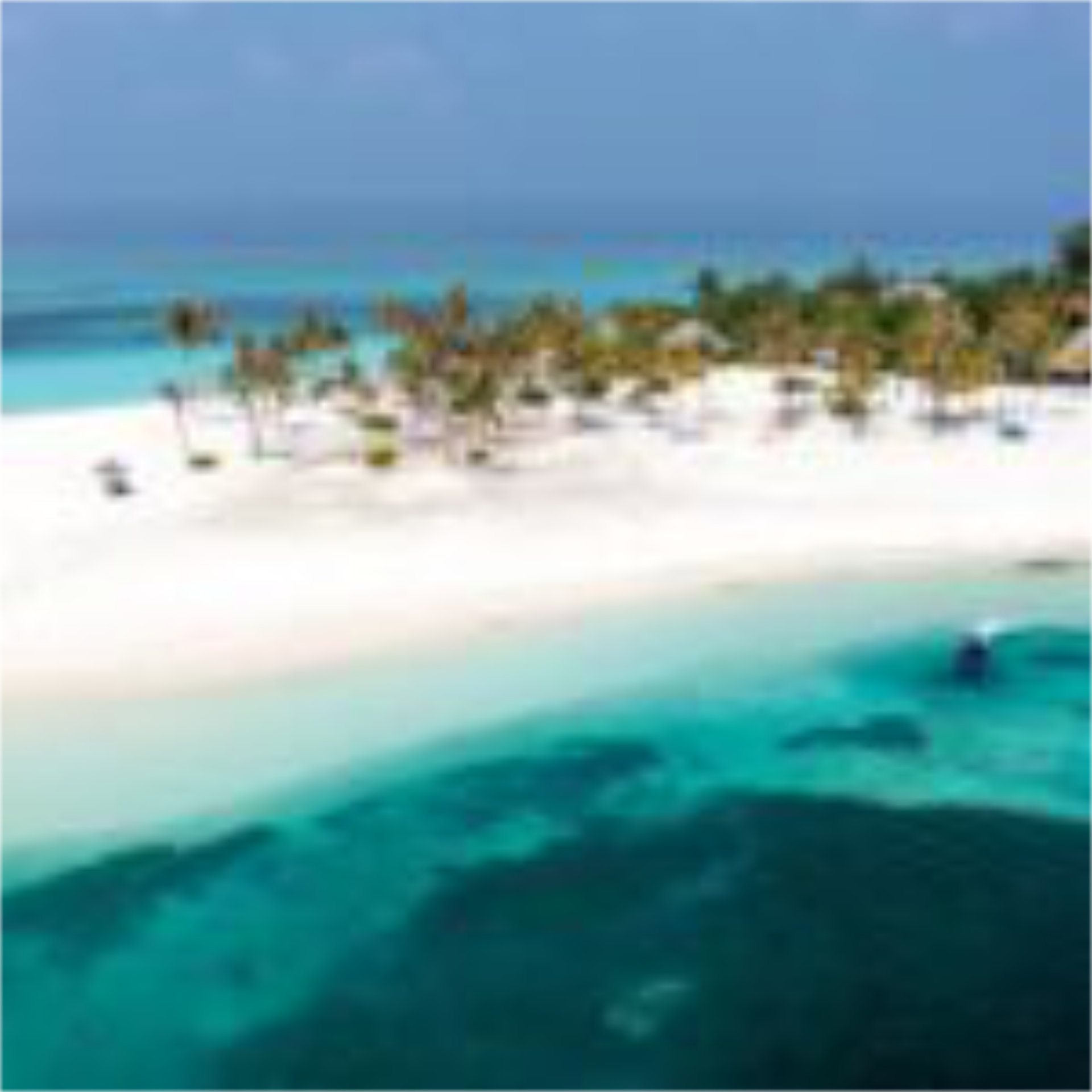 An atoll in the Maldives - Luxury Escapes