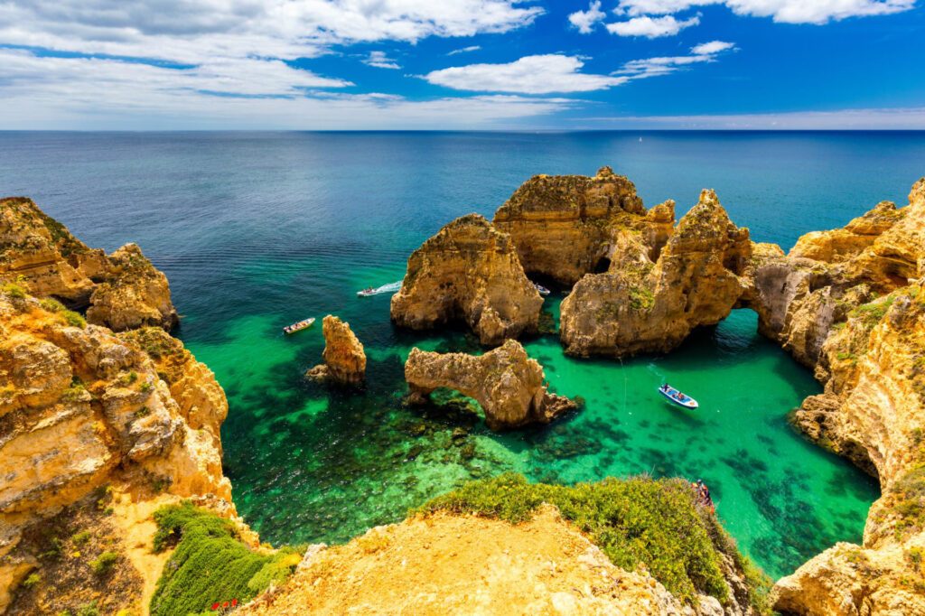 A shot of the Algarve Coast, home to Ponta da Piedade beach - Luxury Escapes