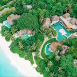 Ariel view of an island resort, one of Luxury Escapes' Best All Inclusive Resorts of All Time - Luxury Escapes