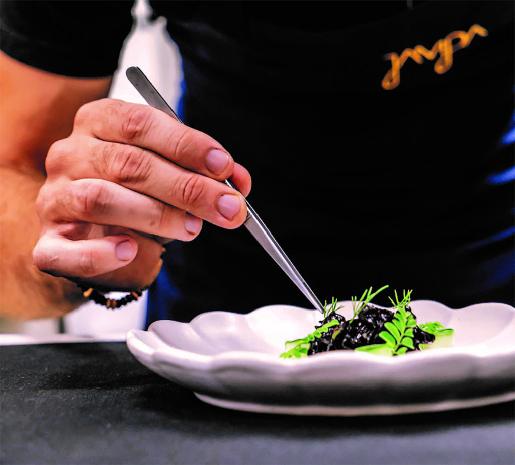 A dish being prepared at Jampa Restaurant, one of the best restaurants in Thailand