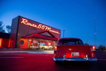 Image of a classic USA diner with a retro car out the front, a cultural classic experience - Luxury Escapes
