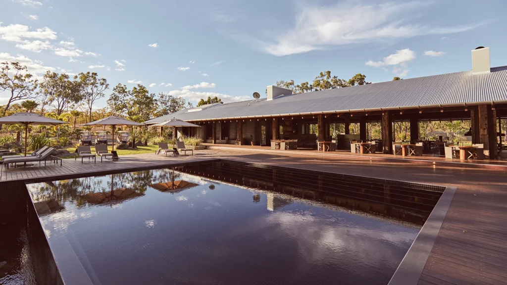 View of the pool at the Mt. Mulligan Lodge, one of Queensland's most unique stays - Luxury Escapes