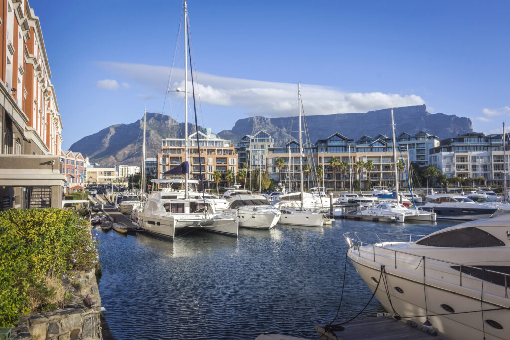 V&A Waterfront, at the foot of Table Mountain, a place to visit when you spend a week in Cape Town - Luxury Escapes