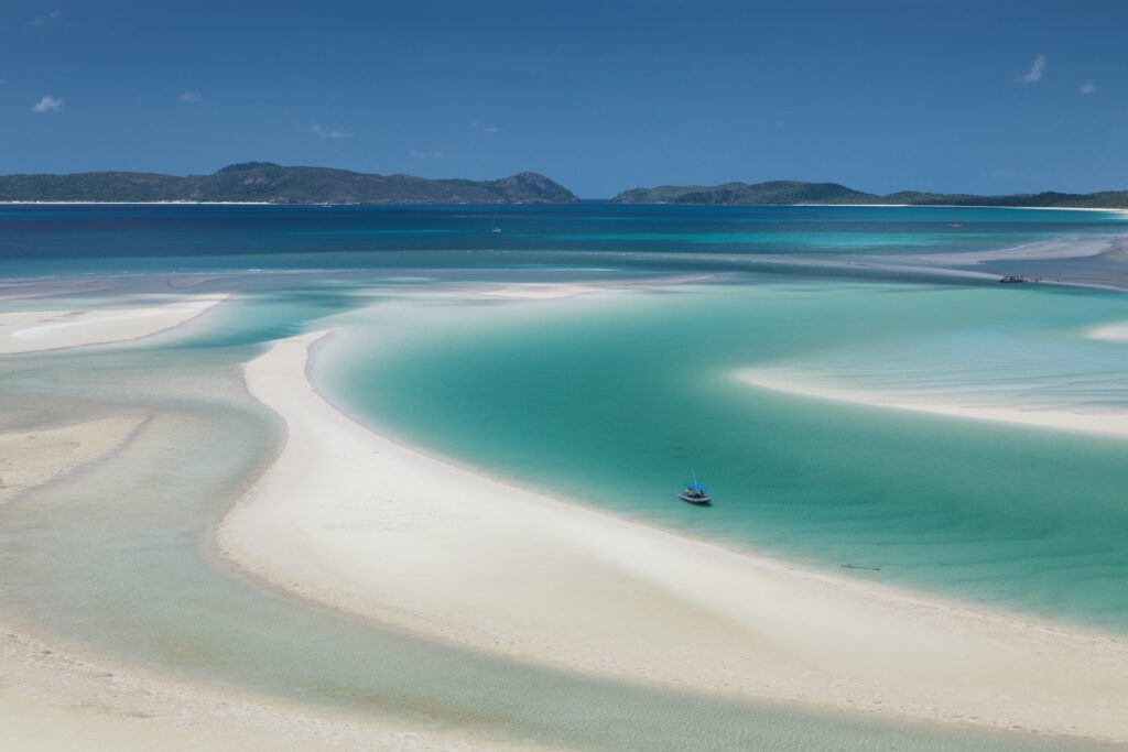 An aerial view of the sandbars at Whitehaven Beach, one of the best places to visit near the Great Barrier Reef