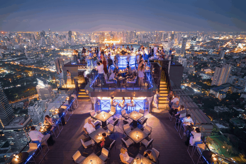 Cross the elegant, orchid-filled lobby of Banyan Tree Bangkok – the city’s only five-star, all-suite hotel – and zip up 61 floors to Moon Bar Bangkok, an achingly cool oasis perched high above the clouds - Luxury Escapes