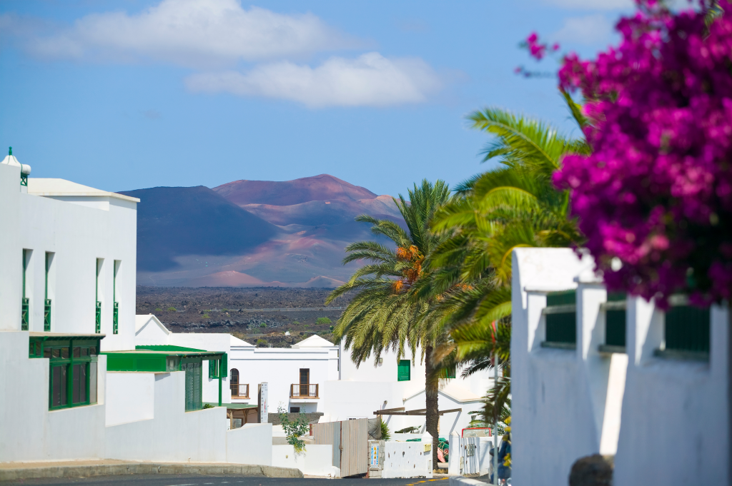 The white-walled streets of Yaiza, one of the best places to stay in the Canary Islands, Spain - Luxury Escapes