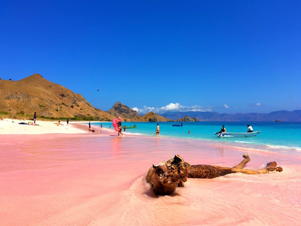 The sands of Lubuan Bajo, or Pink Beach, are a great day trip. Explore while in Indonesia.