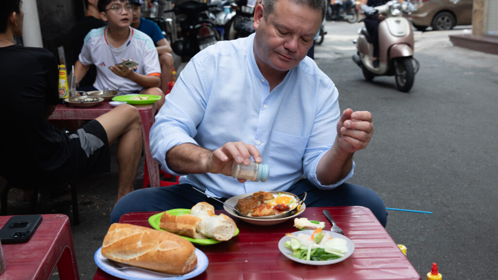 Gary Mehigan eating in Vietnam as part of Luxury Escapes' Signature Series tour - Luxury Escapes