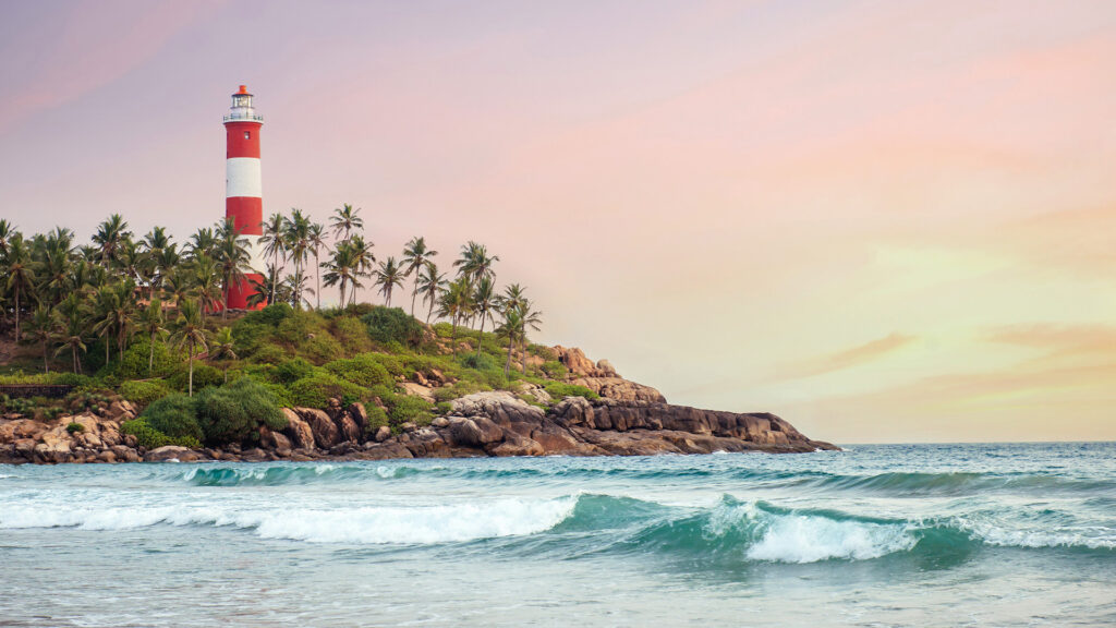 Kovalam Beach, Kerala during sunset is great for a winter escape in India - Luxury Escapes