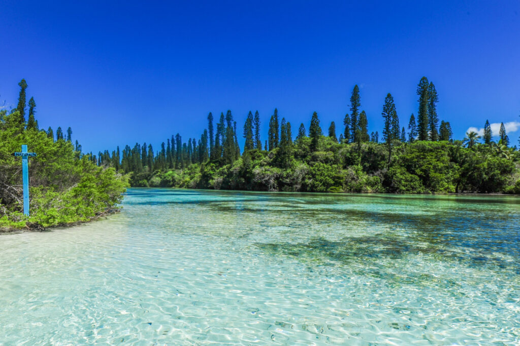The natural swimming pools on the Isle of Pines in New Caledonia - Luxury Escapes