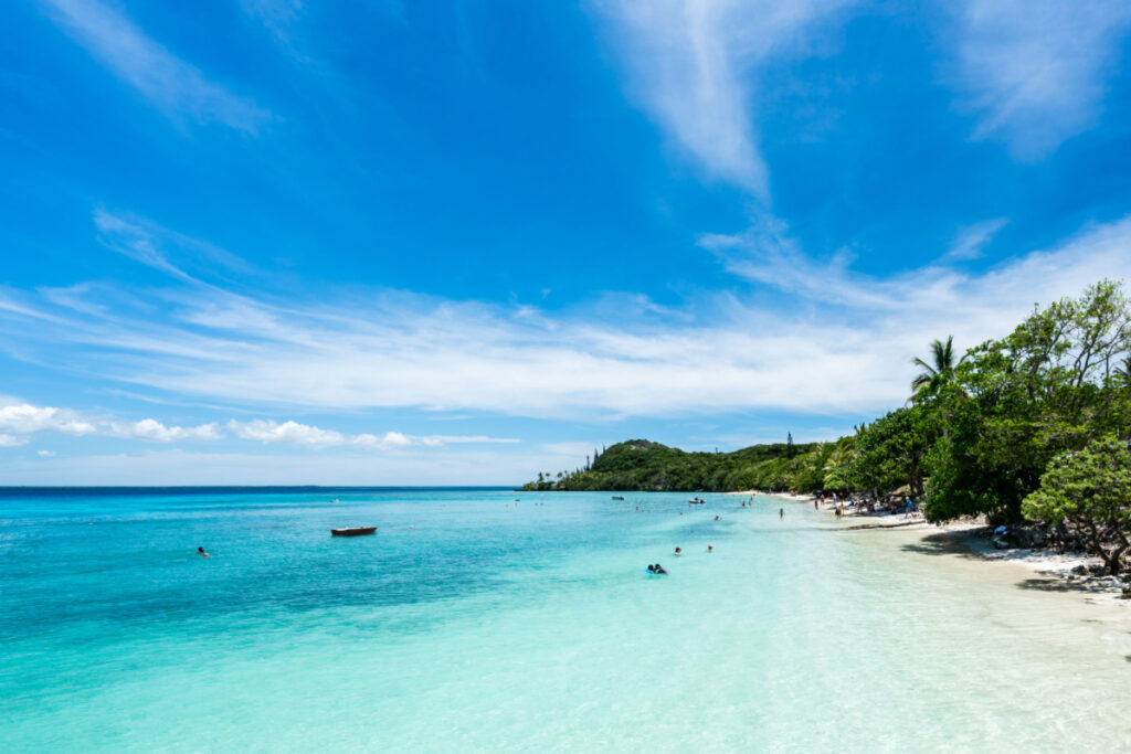 A beach on the island of Lifou in New Caledonia - Luxury Escapes