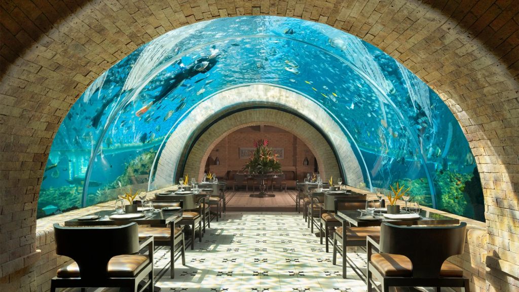 The aquarium seating at Koral, one of the best restaurants in Bali - Luxury Escapes 