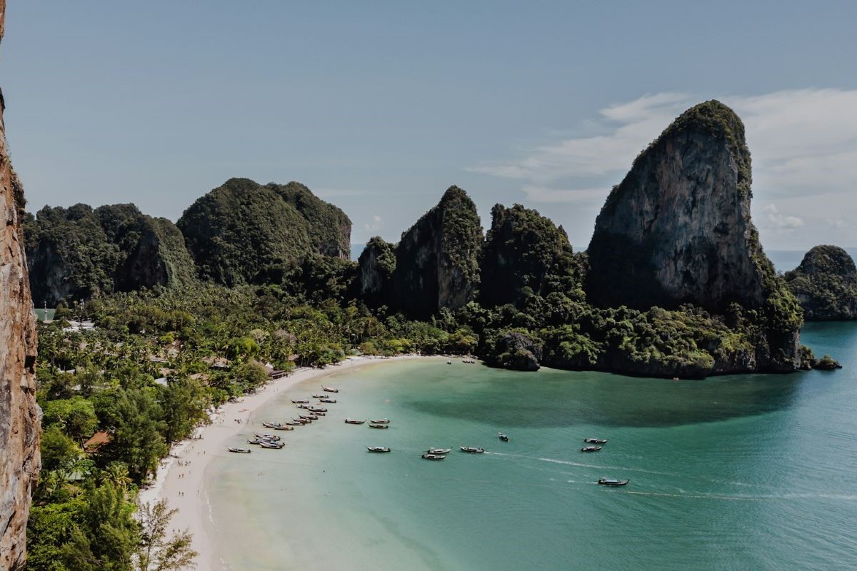 An aerial view over a beach in Phuket, one of the filming locations for the new season of The White Lotus - Luxury Escapes
