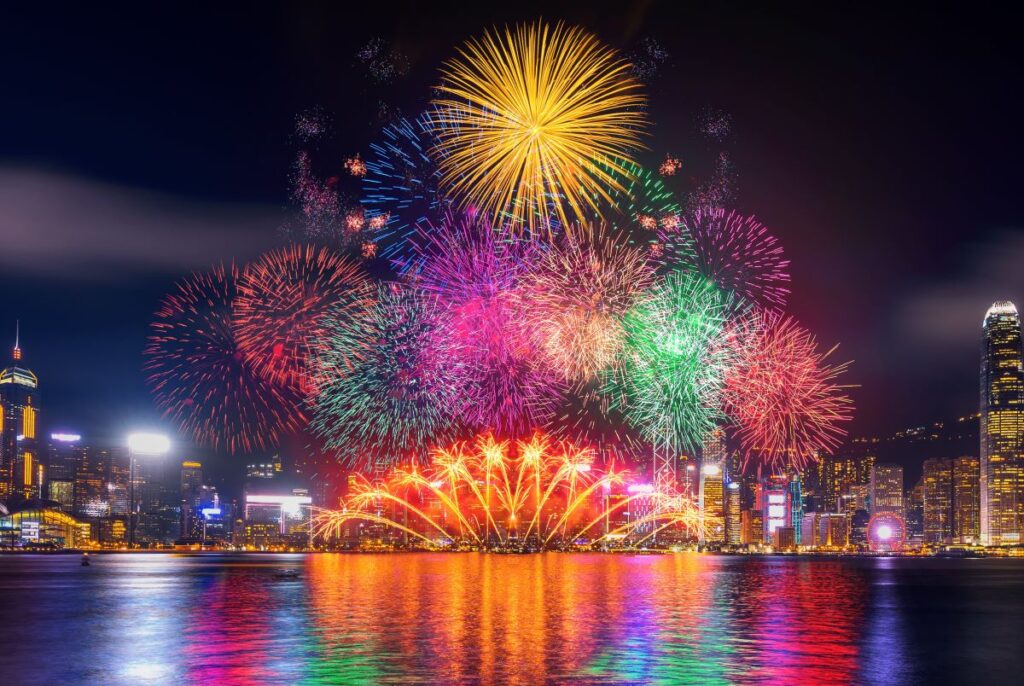 A colourful fireworks display over Hong Kong's Victoria Harbour is a Lunar New Year tradition to celebrate 2024 - Luxury Escapes