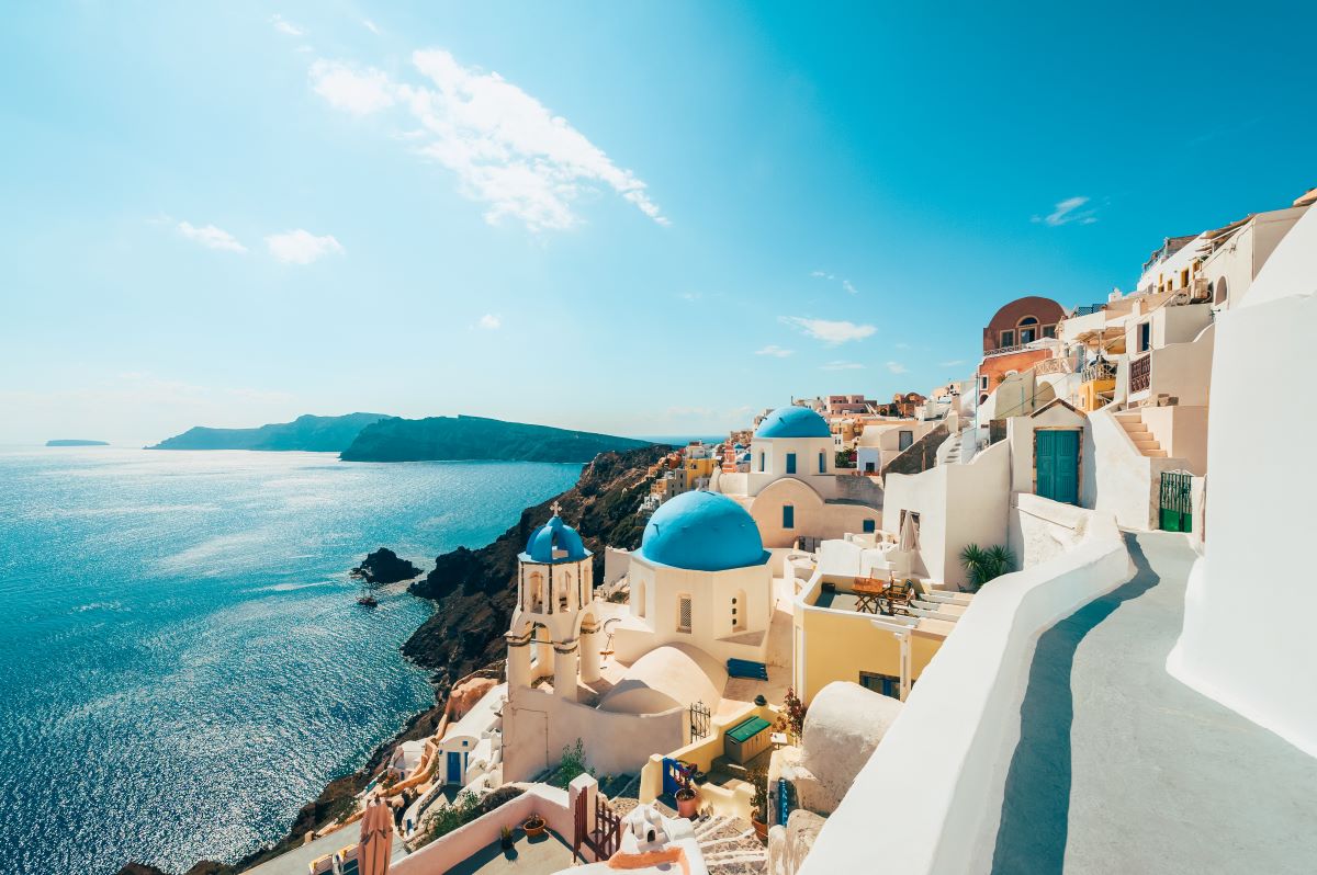 A scenic cliff face in Oia, Santorini, Greece – one of the most popular destinations in Europe to visit during the summer - Luxury Escapes