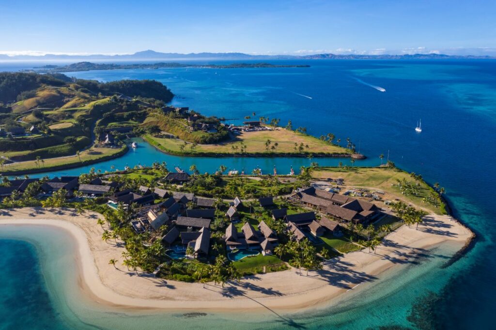 An aerial view of the island resort, Six Senses Fiji, which is one of the best places to stay in Fiji, the coral capital of the world - Luxury Escapes