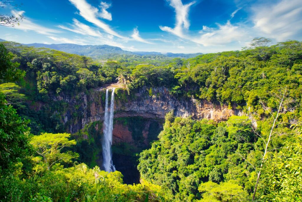 The cascading waters of Chamarel Waterfall are an unmissable feature of any sun-seeker's visit to marvellous Mauritius - Luxury Escapes