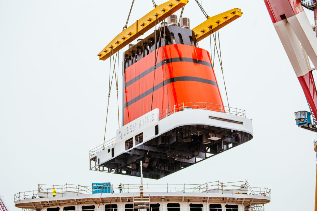 Image of the Queen Anne funnel being set in place on Cunard's new Queen Anne cruise ship.