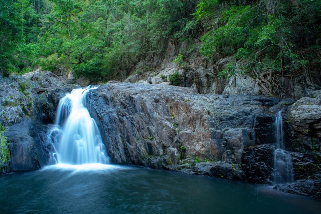 Crystal Cascades Waterfall in Redlynch Valley Barron Gorge National Park west of Cairns part of The Tropical North Queensland Australia - Luxury Escapes 