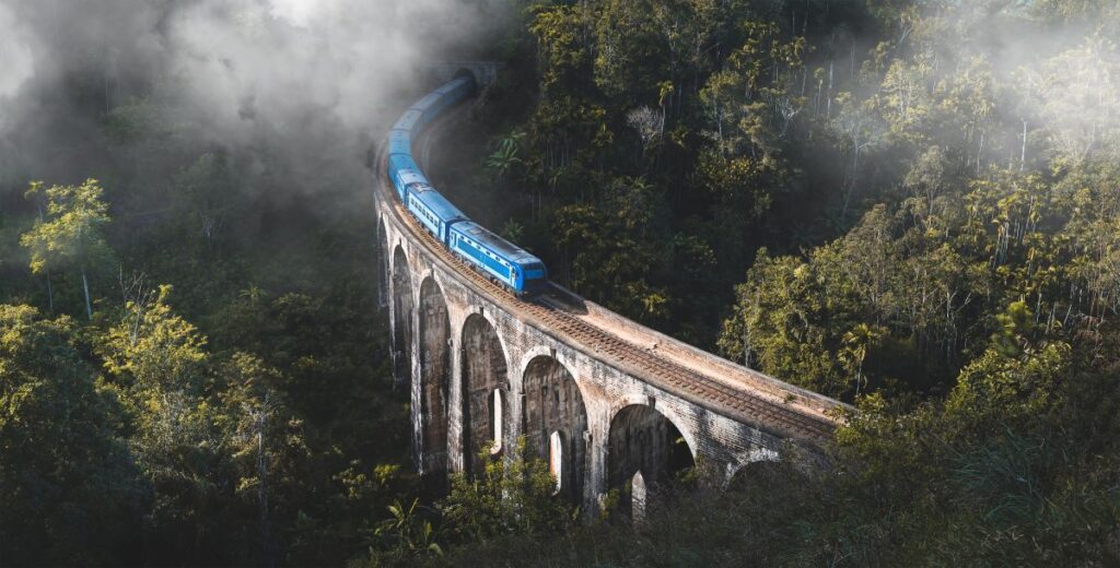 Train to Ella in Sri Lanka over the Nine Arch Bridge, one you will cross when traveling Sri Lanka on a luxury tour - Luxury Escapes