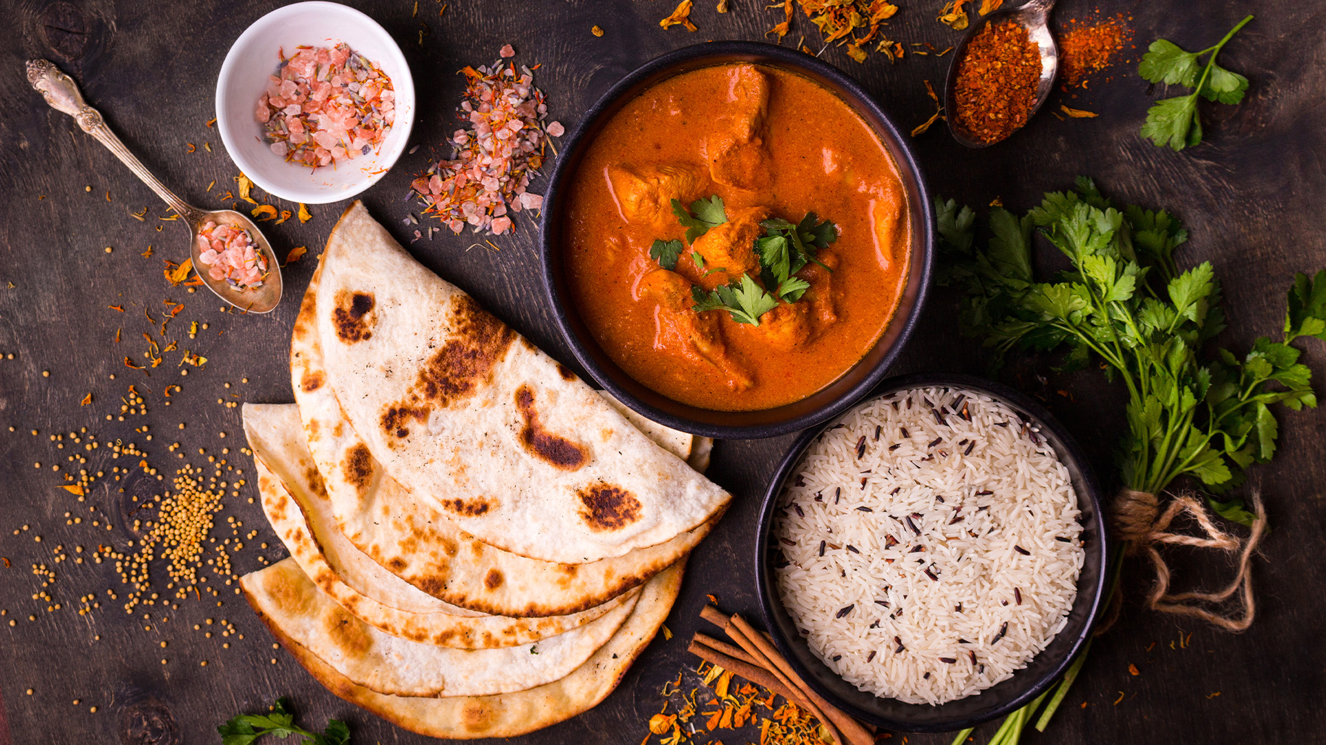 Sampling butter chicken in New Delhi is a must-do during a culinary exploration of India's Golden Triangle – Luxury Escapes