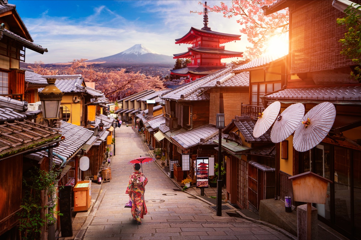 A geisha walking down the streets of Old Town Kyoto, Japan, a reason to visit Japan on a tour - Luxury Escapes