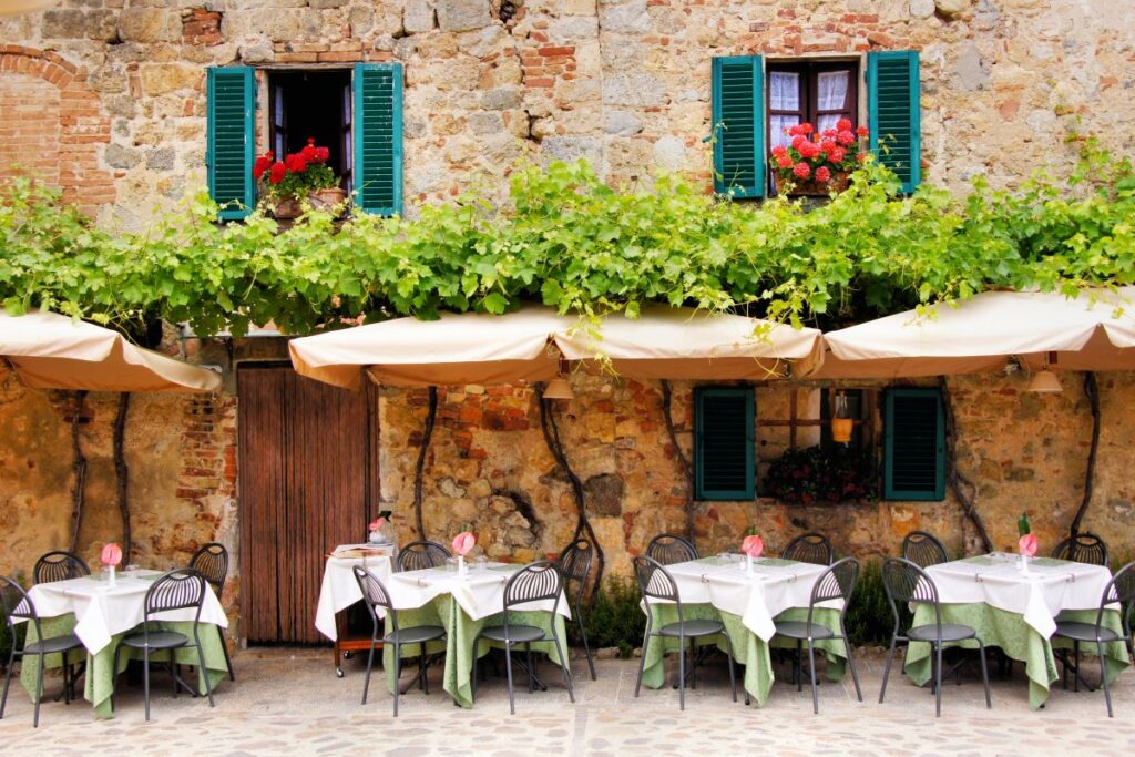 A restaurant in Tuscany, Italy, one of the world's best wine regions - Luxury Escapes 